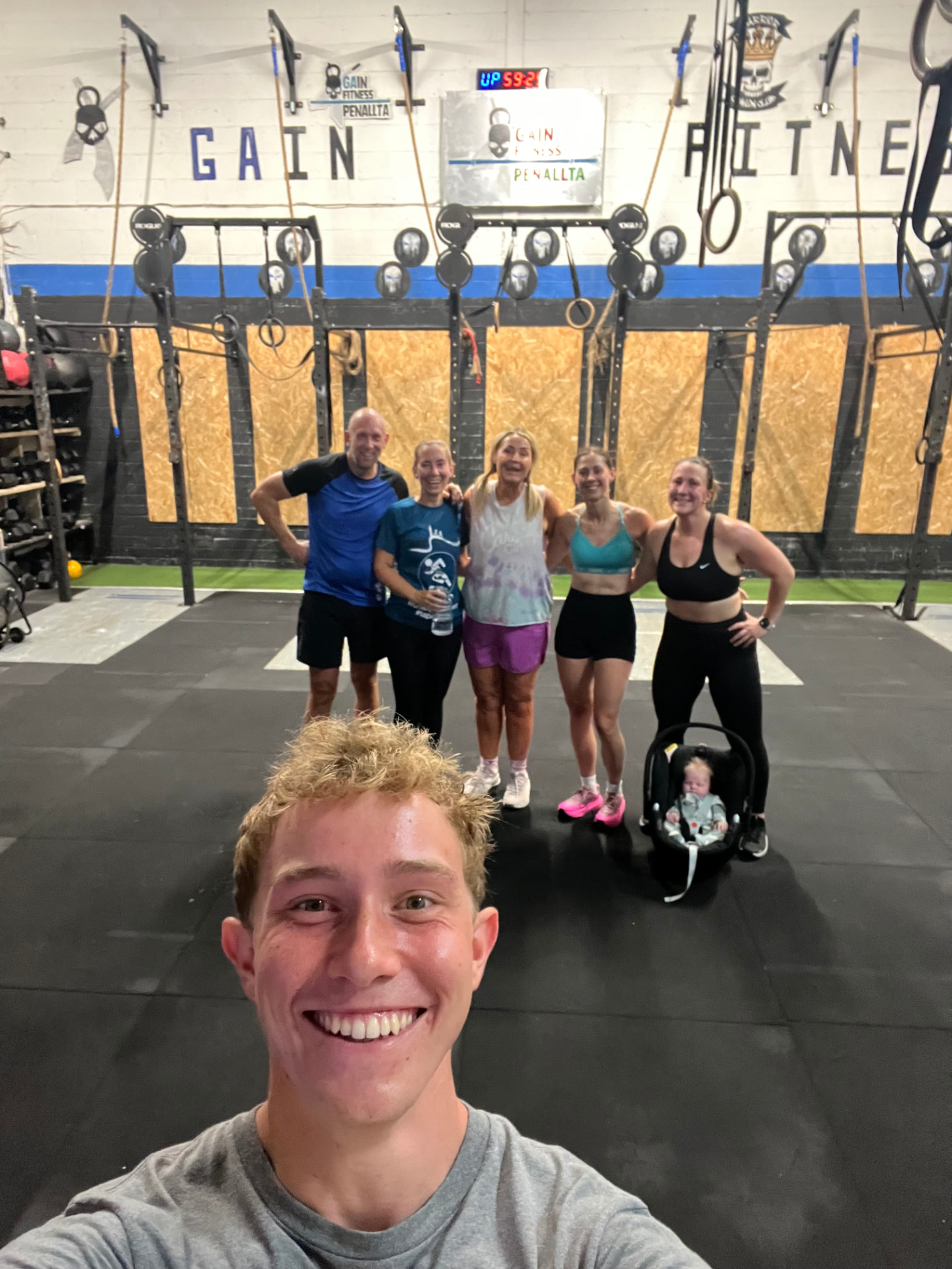 Joel coaching a group session in the gym